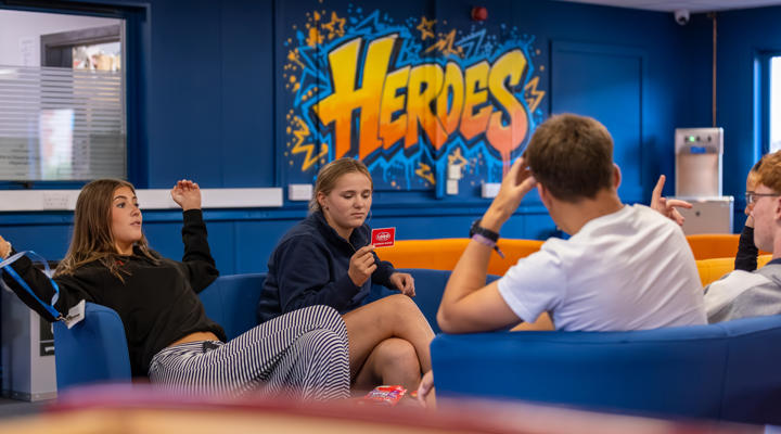 Heroes Common Room Students Playing Card Games