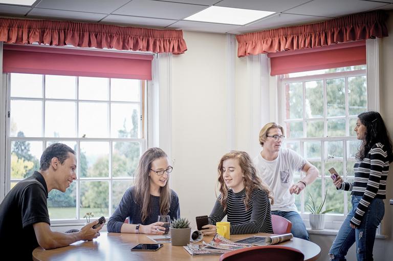 Group Of Five Students Relaxing In Hartpury House Accommodation
