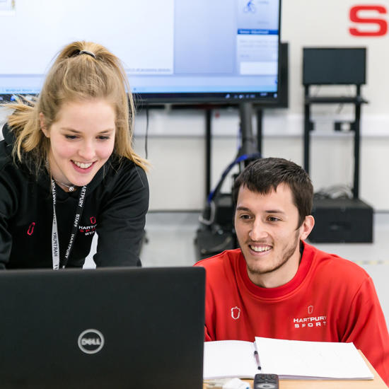 Sports Students Working On Laptop